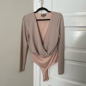 Pink sparkly wrap front bodysuit